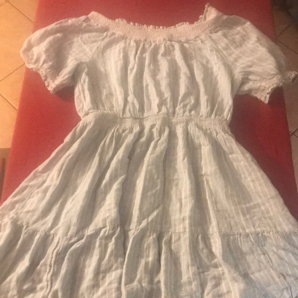 A mid thigh off the shoulders dress